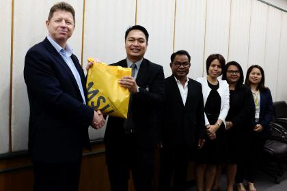 Bob Doherty and representatives of Mahasarakham University, Thailand
